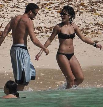 Men In Bikinis At Beach