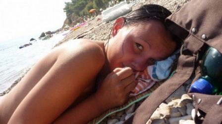 Naked Girl Laying On Beach