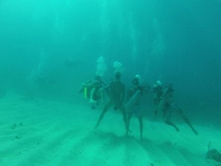 Naked Scuba Diving