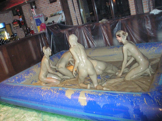 Naked Women Mud Wrestling