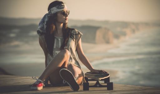 Sitting Legs Shorts Sneakers Sunglasses Girl Skateboard