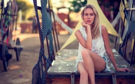 Skinny Blonde Girl Arm Tattoo Carriage Bokeh Light