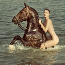 Beautiful Nude Girl Riding On Horse