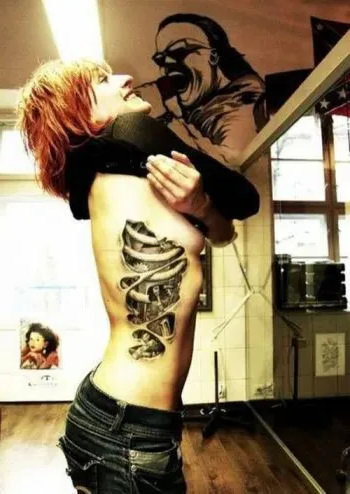 cool ripped skin tattoo